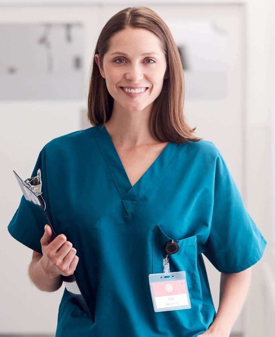 portrait-of-smiling-female-doctor-wearing-scrubs-s-9FCN8AY.jpg